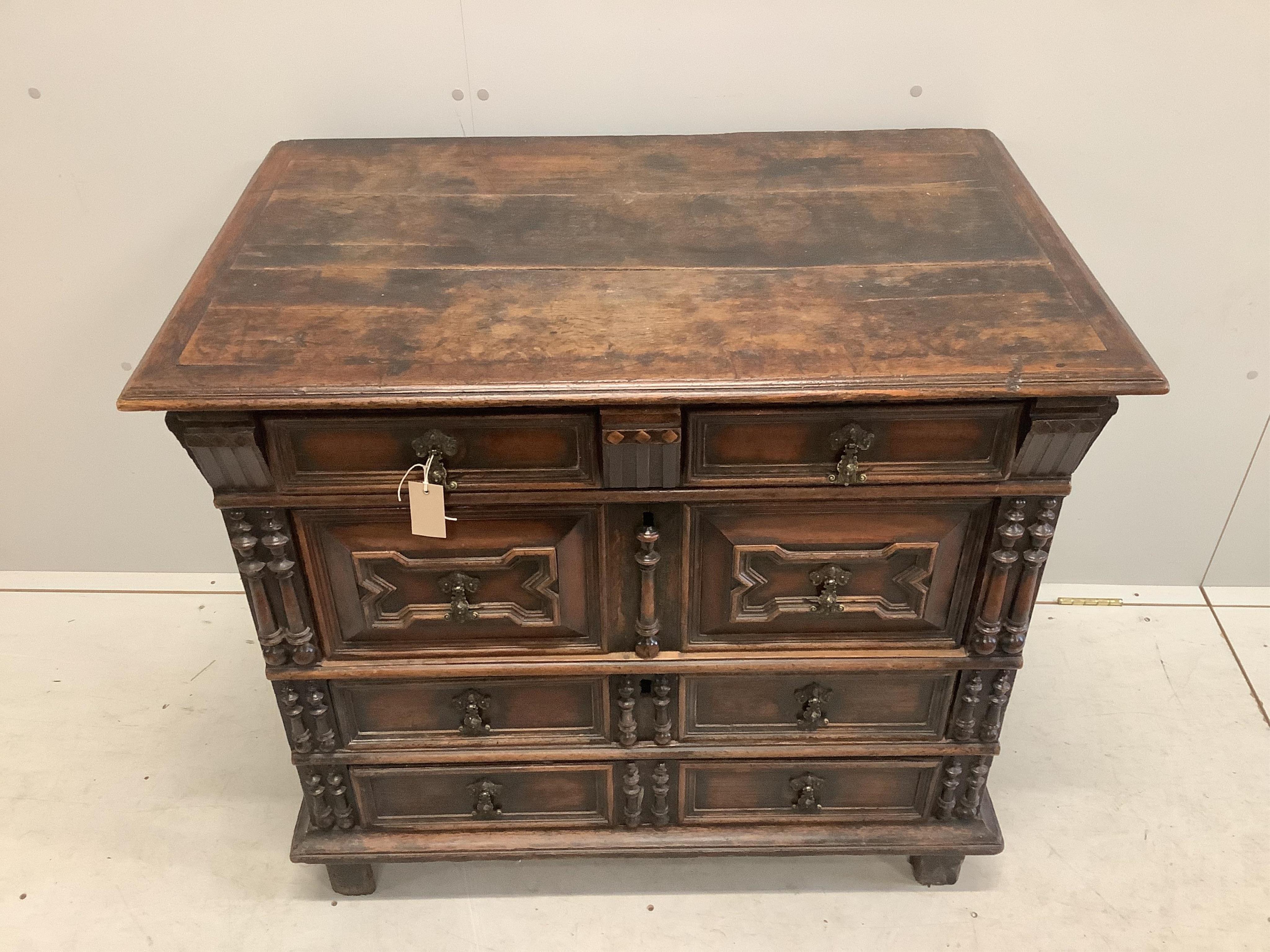 An 18th century oak block front chest of drawers, width 96cm, depth 61cm, height 85cm. Condition - fair to good